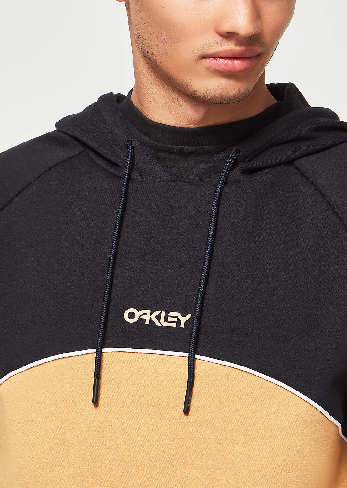 Oakley Men&#39;s TNP Rotation RC DWR Hood Blackout/Light Curry