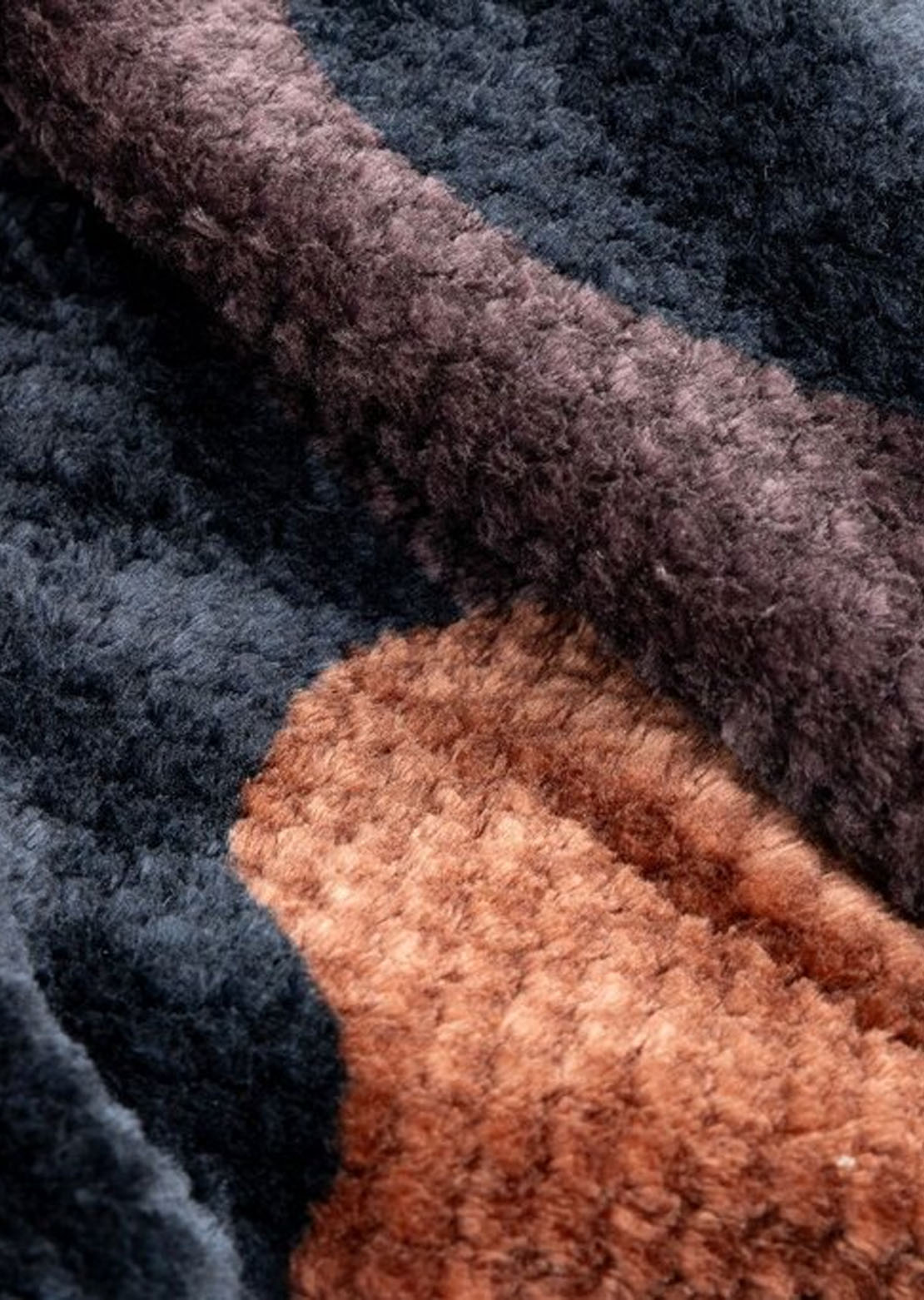 Rumpl Fleece Puffy Blanket Puzzled Black