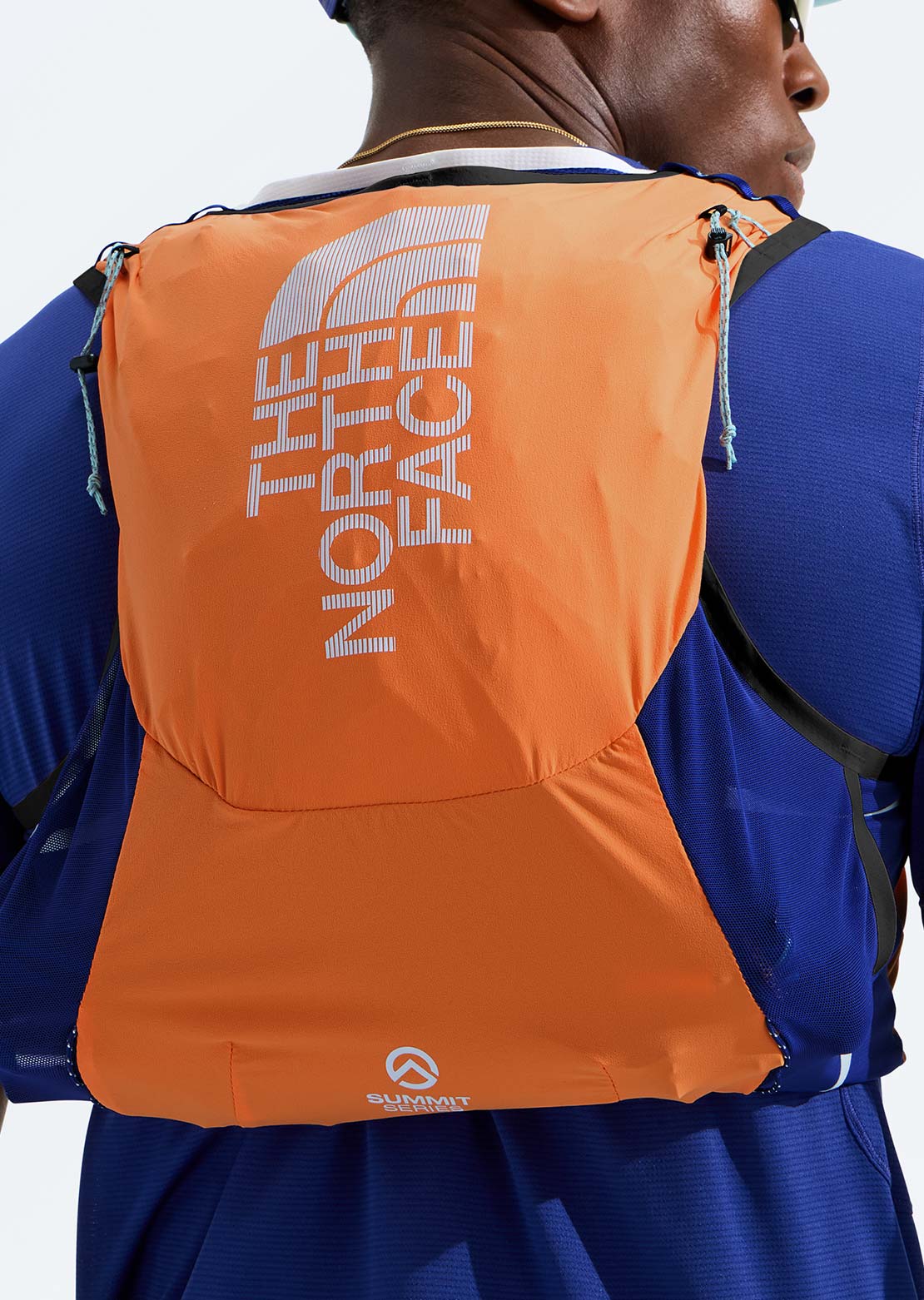 The North Face Unisex Summit Run 10 Vest Papaya/Bold Blue