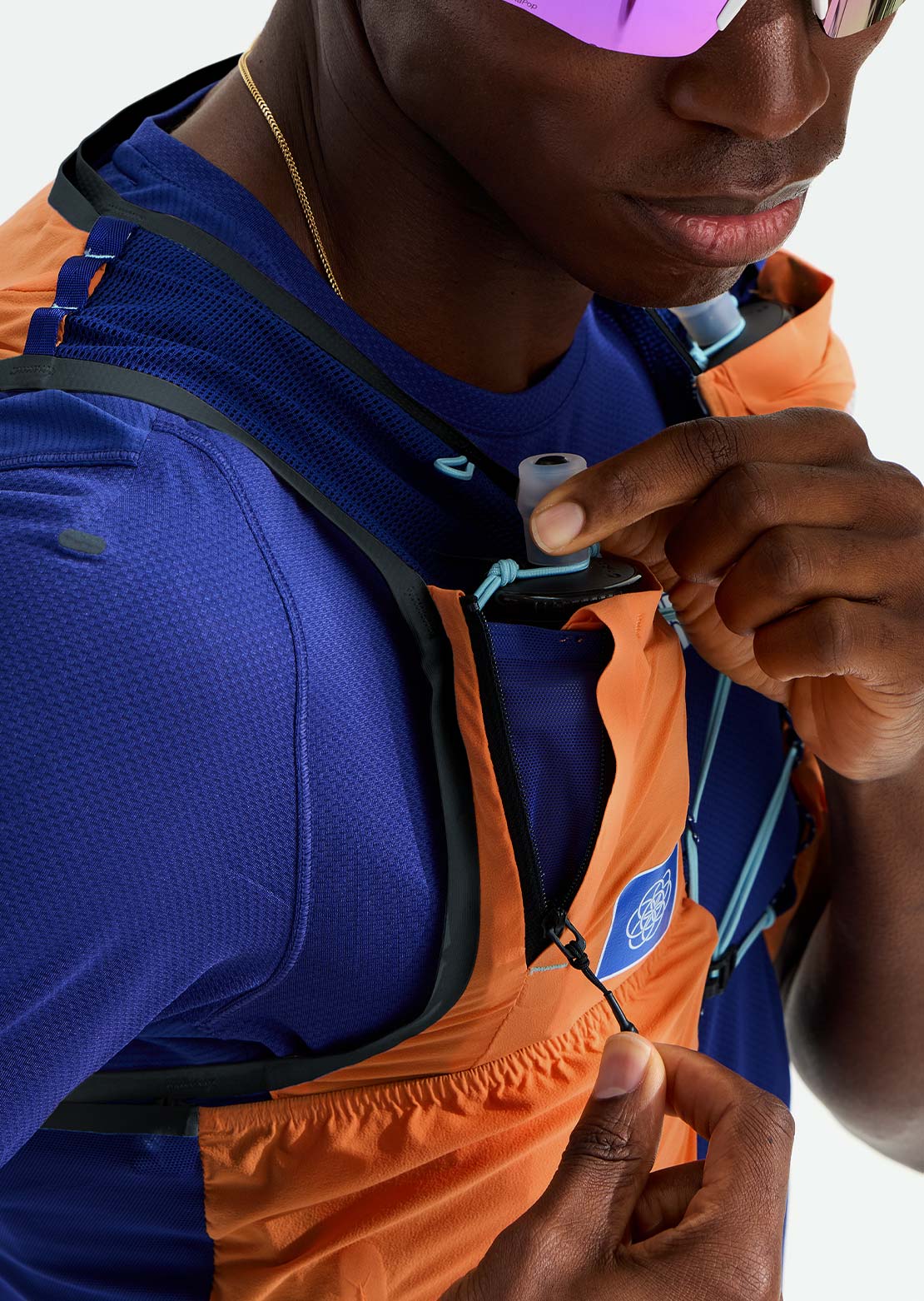 The North Face Unisex Summit Run 10 Vest Papaya/Bold Blue