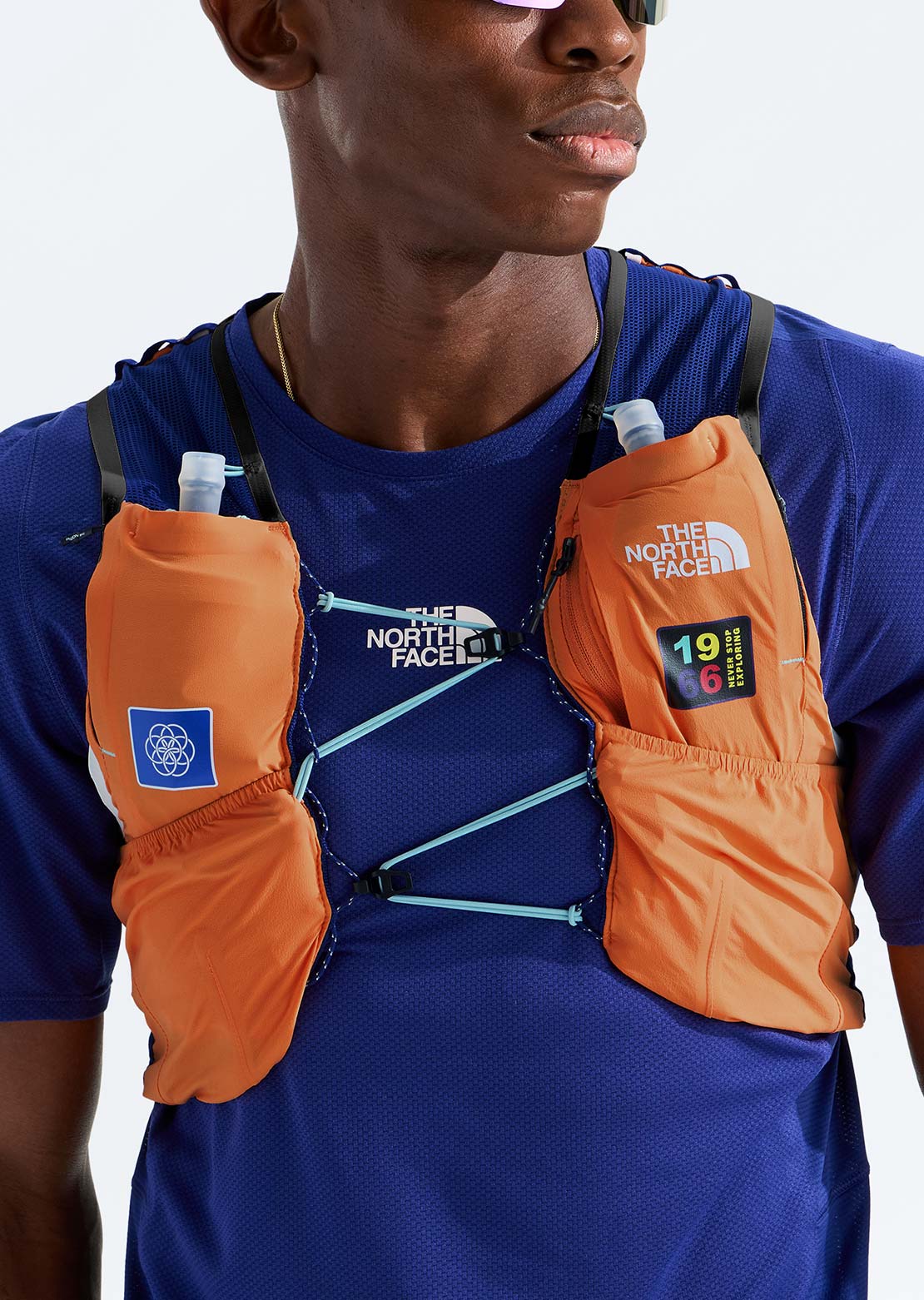 The North Face Unisex Summit Run 10 Vest Papaya/Bold Blue