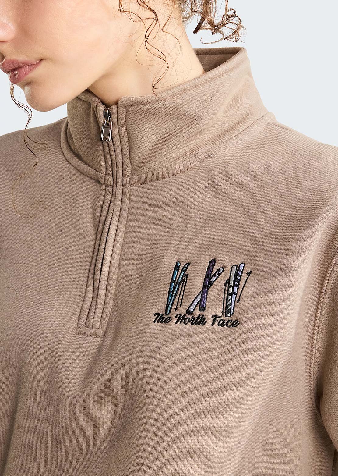 The North Face Women's Ski Embro Relaxed 1/4 Zip Graphic Sweatshirt